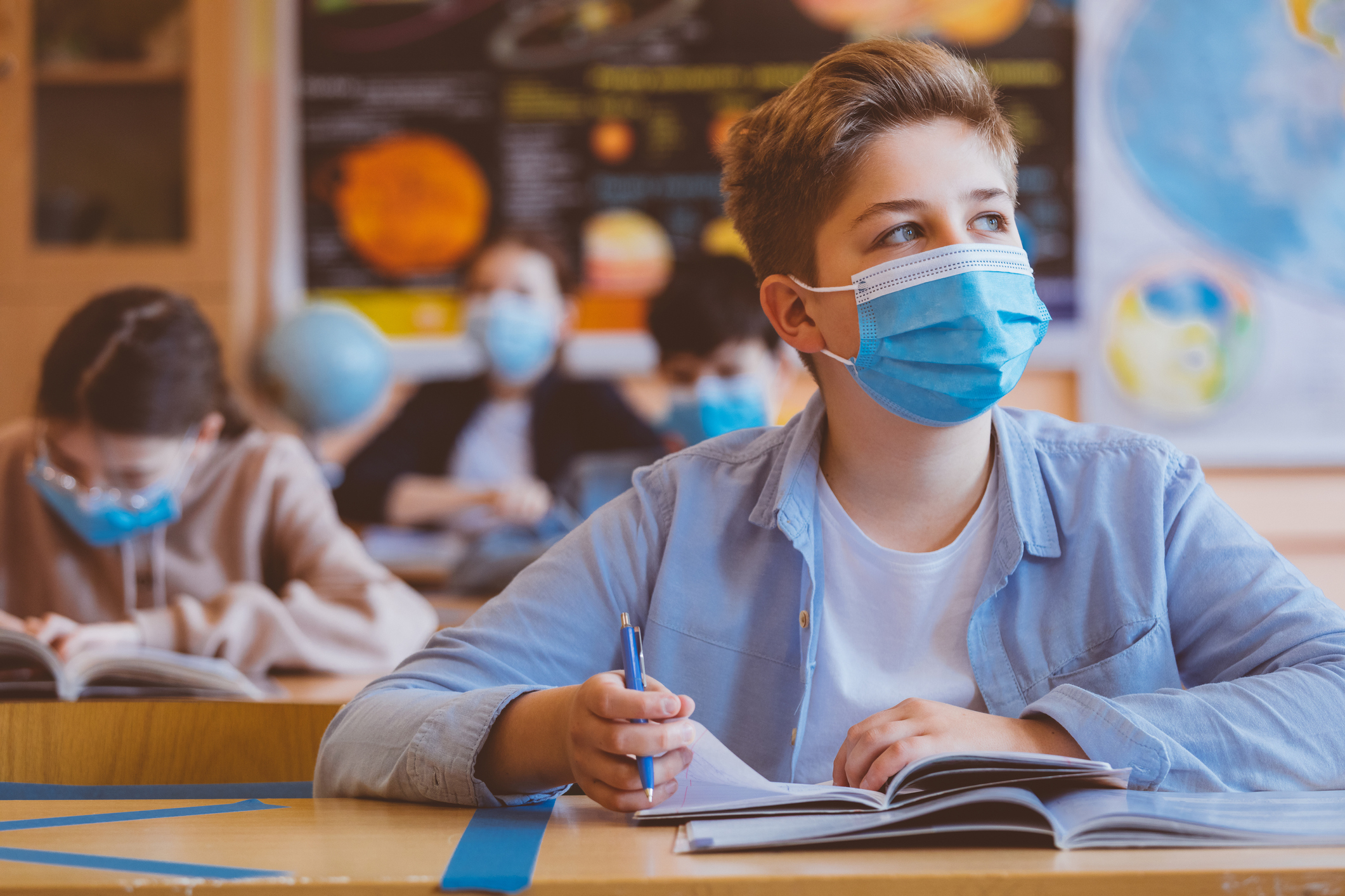 High school boy student at school wearing N95 Face masks High school boy student at school wearing N95 Face masks