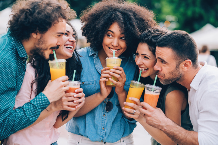Group of friends drinking smoothies
