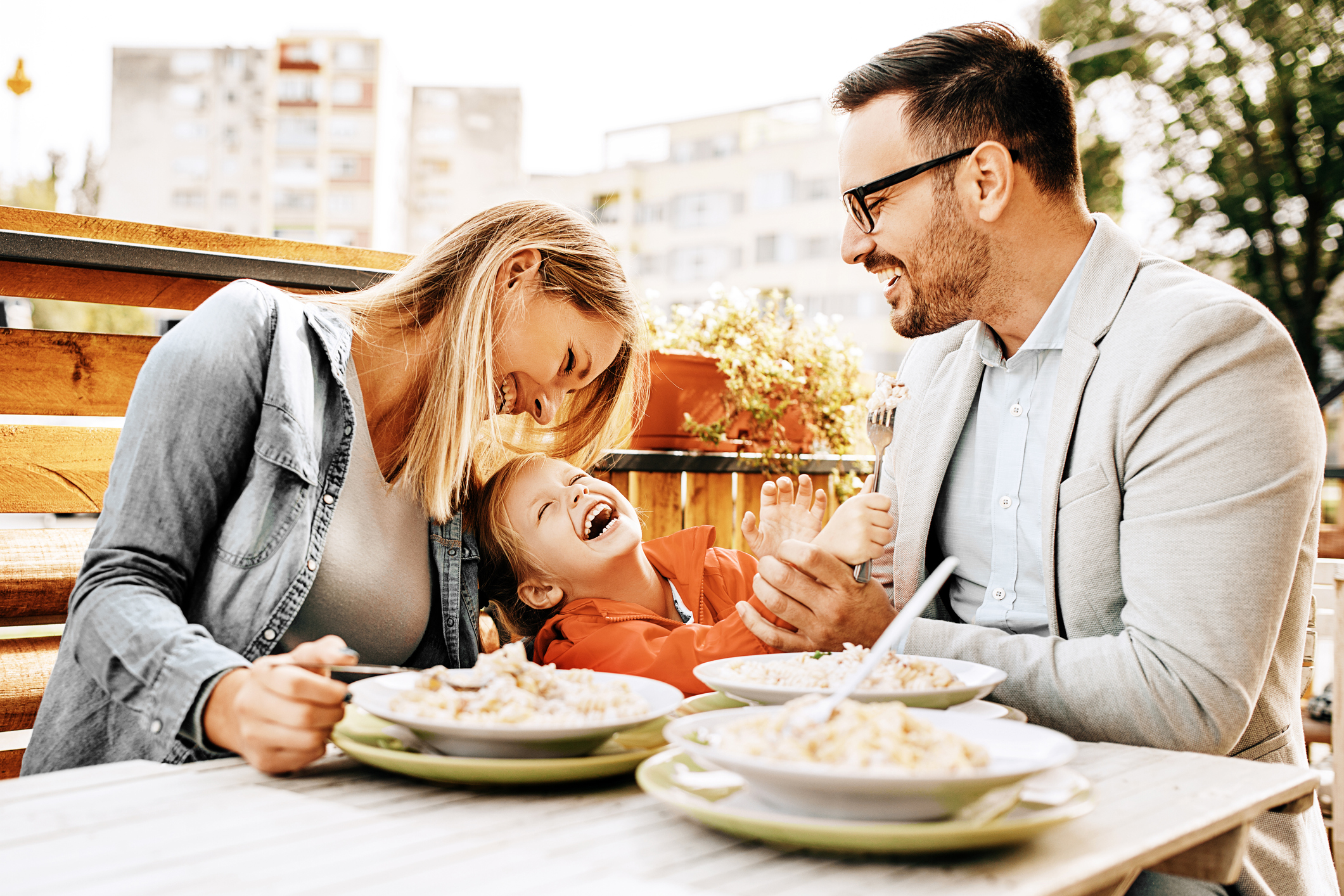 Family enjoying restaurant Family enjoying restaurant